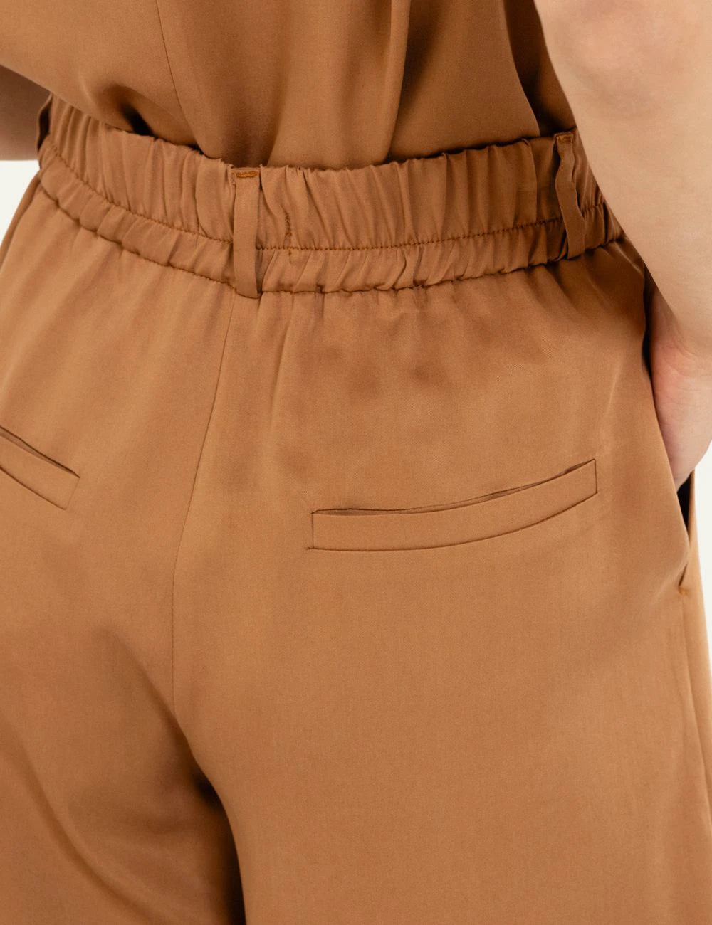Philosophy pleated shorts camel tailored back detail view