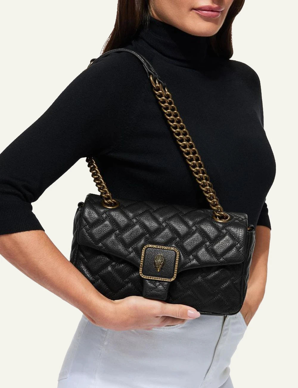 Kurt Geiger Pimlico shoulder bag worn on model blackleather chain strap