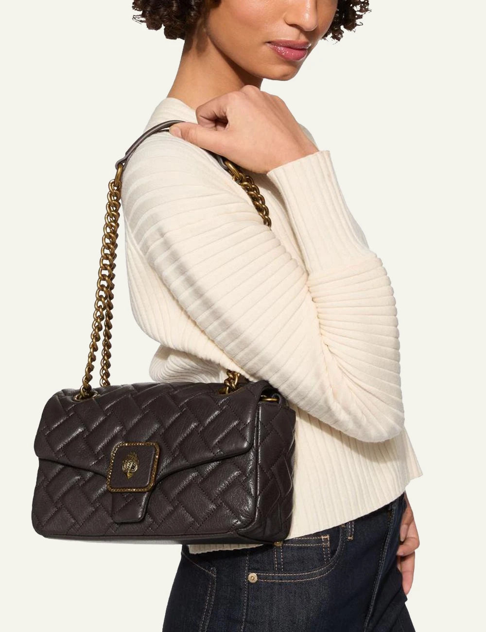 Kurt Geiger Pimlico shoulder bag worn on model brown leather chain strap