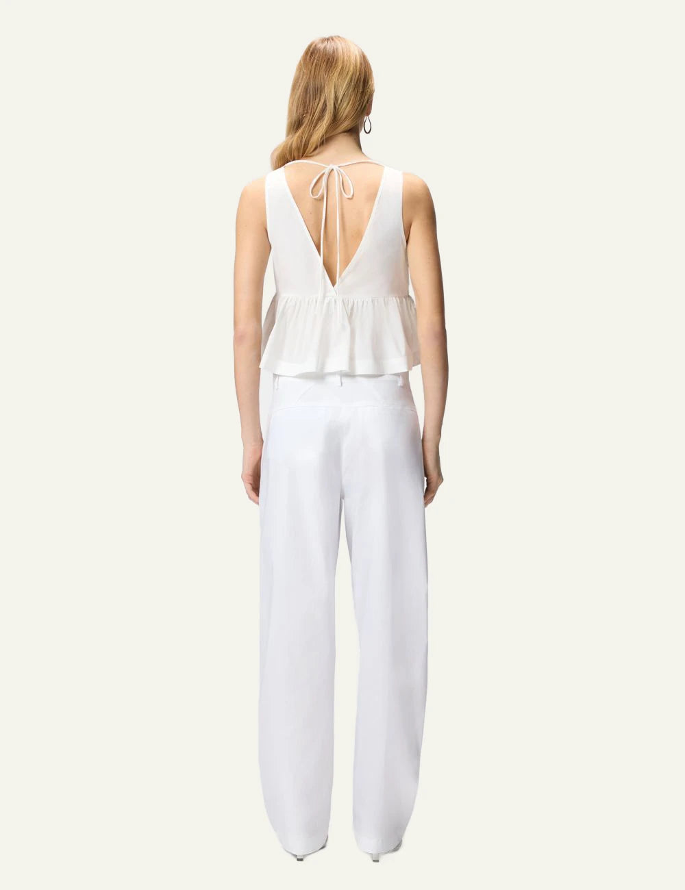 Pinko cropped top white cotton poplin V neck tie back ruffle hem back view