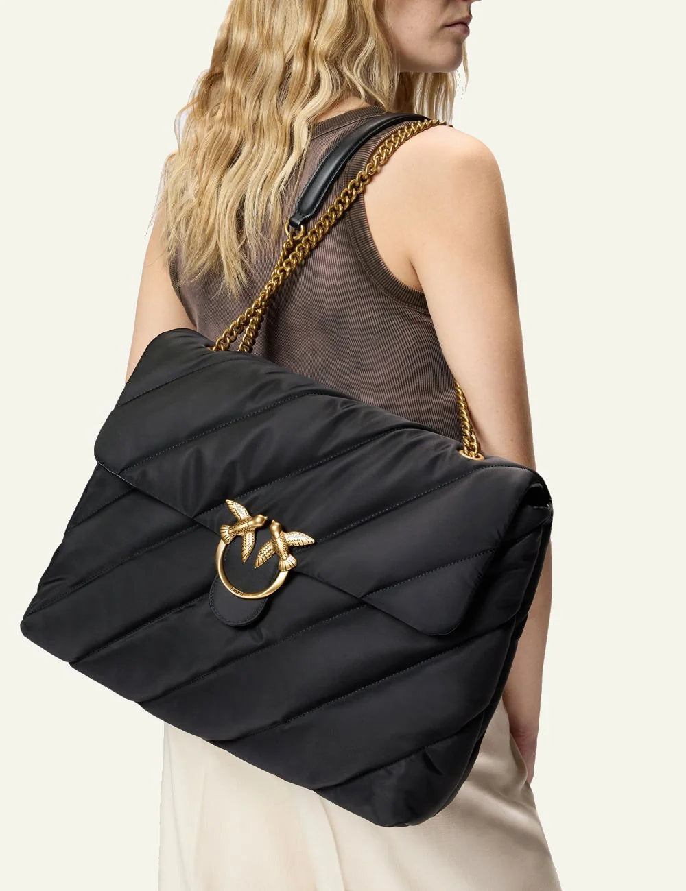 Pinko Love Bag Puff black quilted nylon chain strap front model view