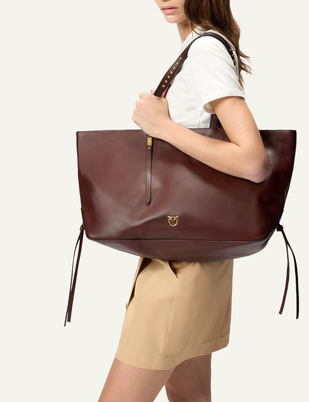 Pinko shopper bag brown leather medium elongated shoulder bag front model view