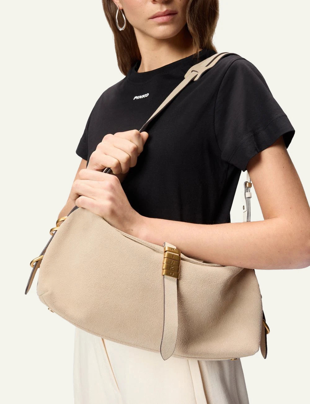 Pinko shoulder bag beige suede saddle baguette adjustable strap front model view