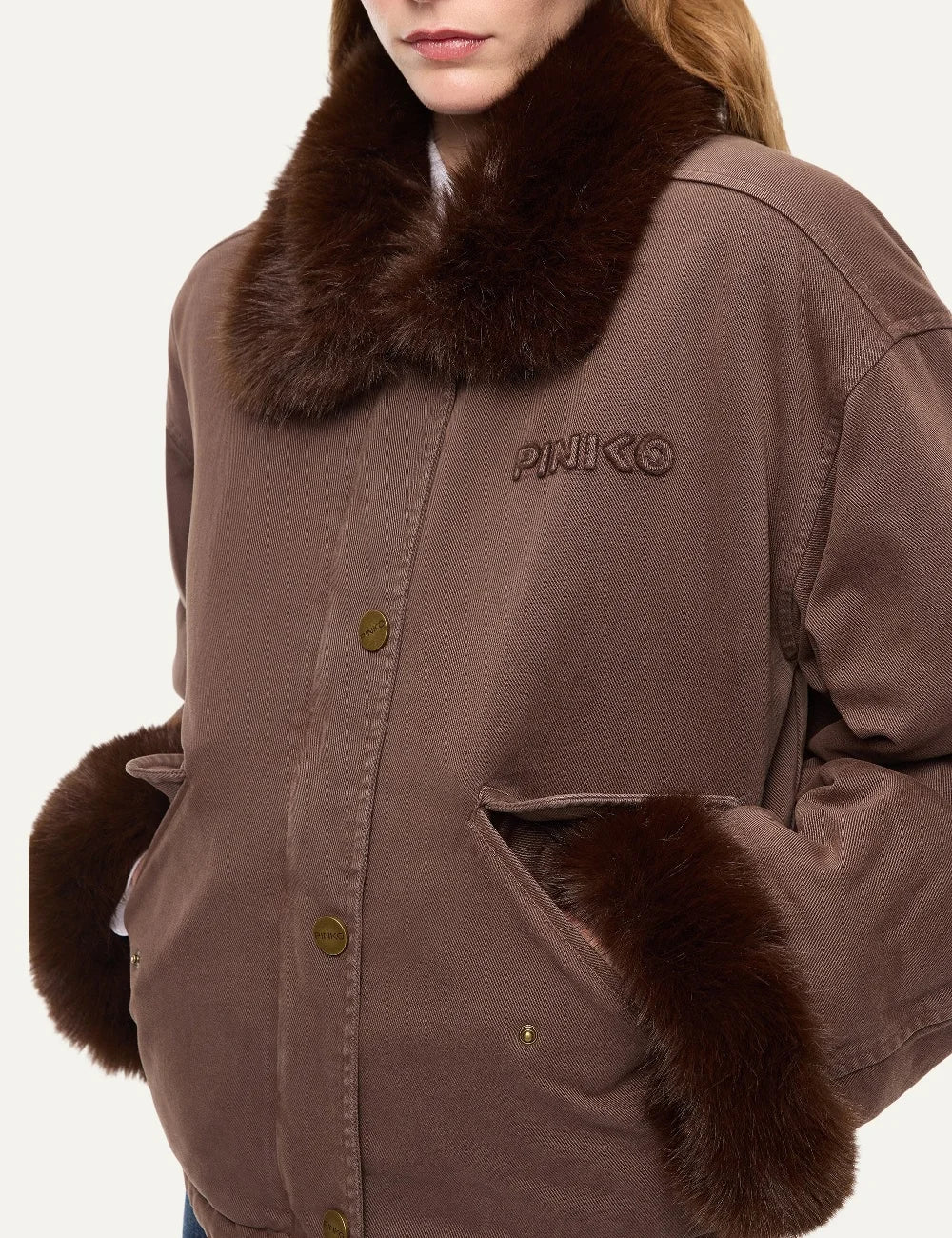 PINKO women's brown-grey cropped padded cotton jacket with dark brown faux fur collar and cuffs, flap pockets and drawstring hem close up view
