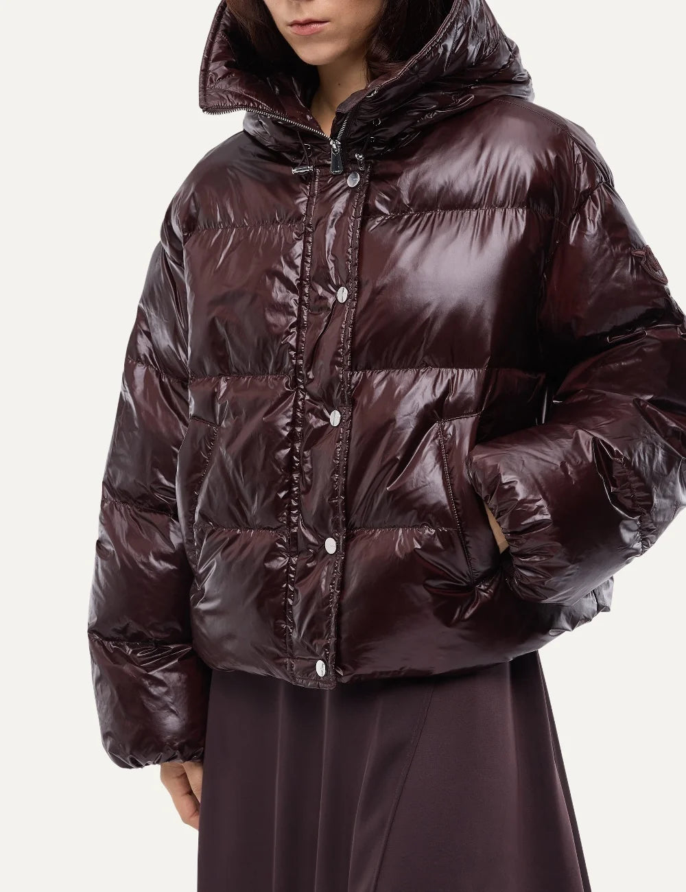 PINKO women's burgundy cropped puffer jacket in semi-glossy padded technical fabric with hood, horizontal quilting and snap-button closure model