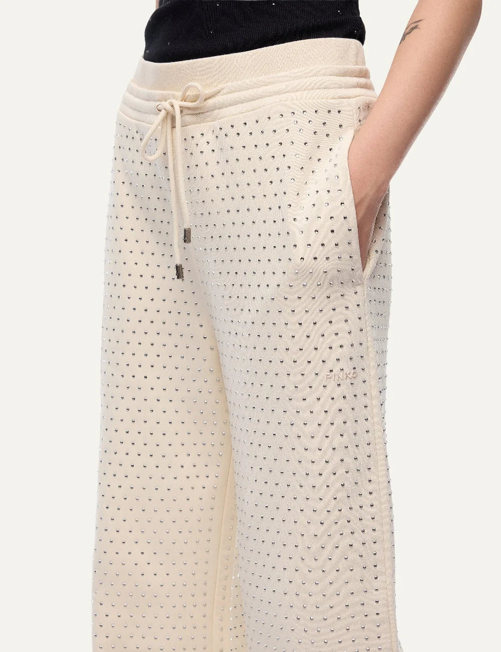 Women's Pinko ecru wide-leg cotton fleece trousers with all-over rhinestones and drawstring waist close up details