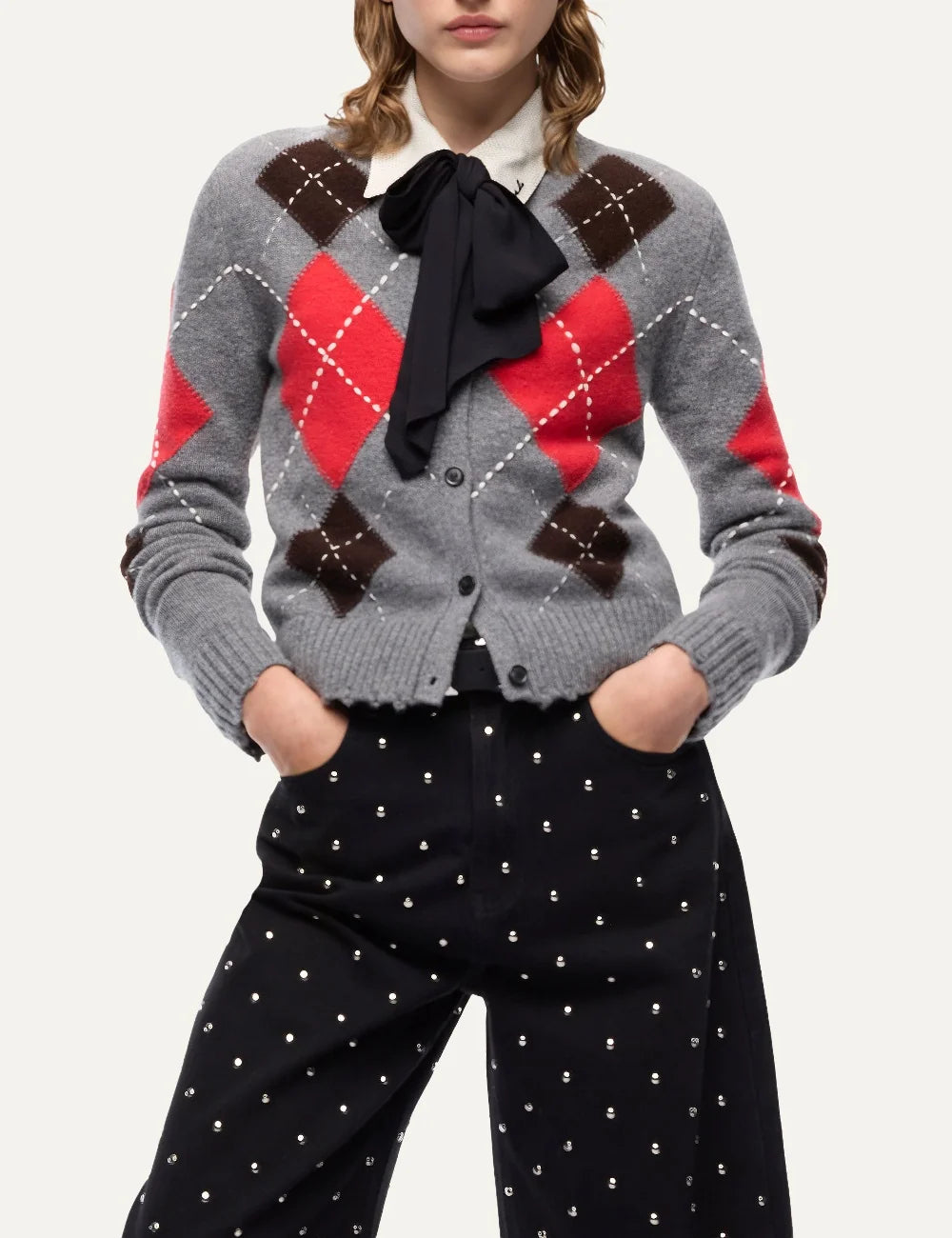 Pinko women's grey wool and cashmere cardigan with red and brown argyle pattern, white stitched details and front buttons model