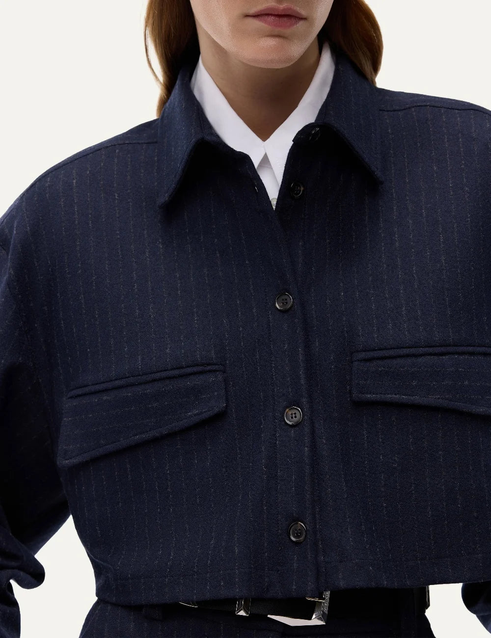 Pinko navy blue cropped pinstripe shirt with boxy fit, long sleeves, button closure and asymmetric flap pockets detail