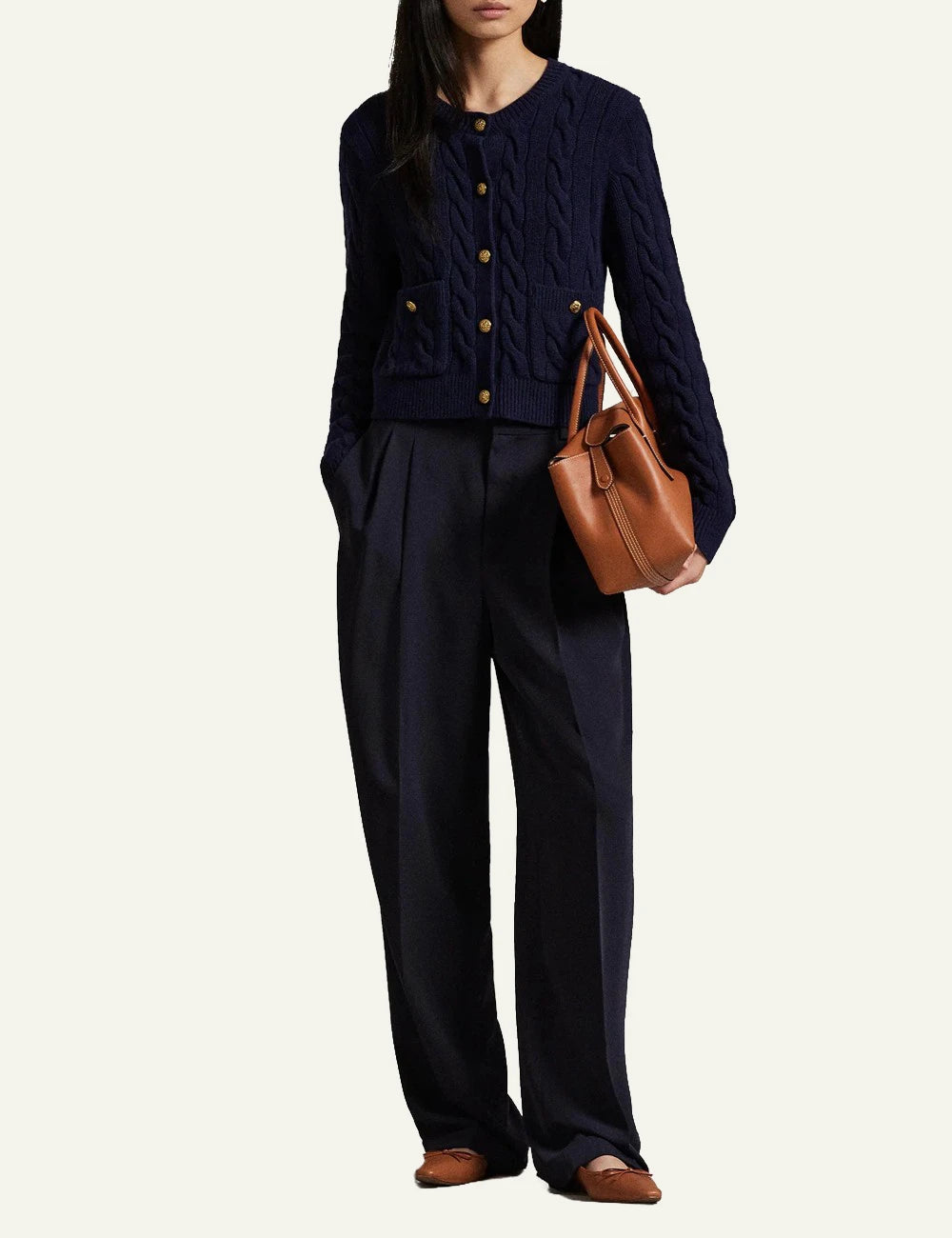 Women's Polo Ralph Lauren cable-knit cardigan in navy blue with gold-tone buttons and front pockets full body