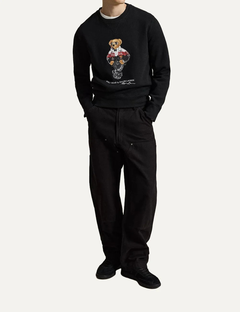 Polo Ralph Lauren men's black crewneck sweatshirt featuring a racing-inspired Polo Bear graphic, signature lettering, V-inset neckline and ribbed trims full body