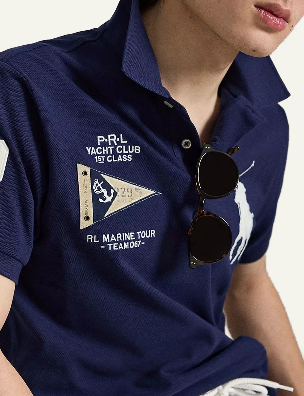 Polo Ralph Lauren navy polo shirt with Big Pony and yacht club embroidery front detail view
