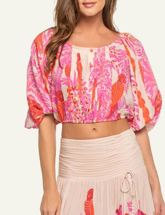 Poupette St Barth Bova crop top scoop neck puff sleeve pink tropical print front view