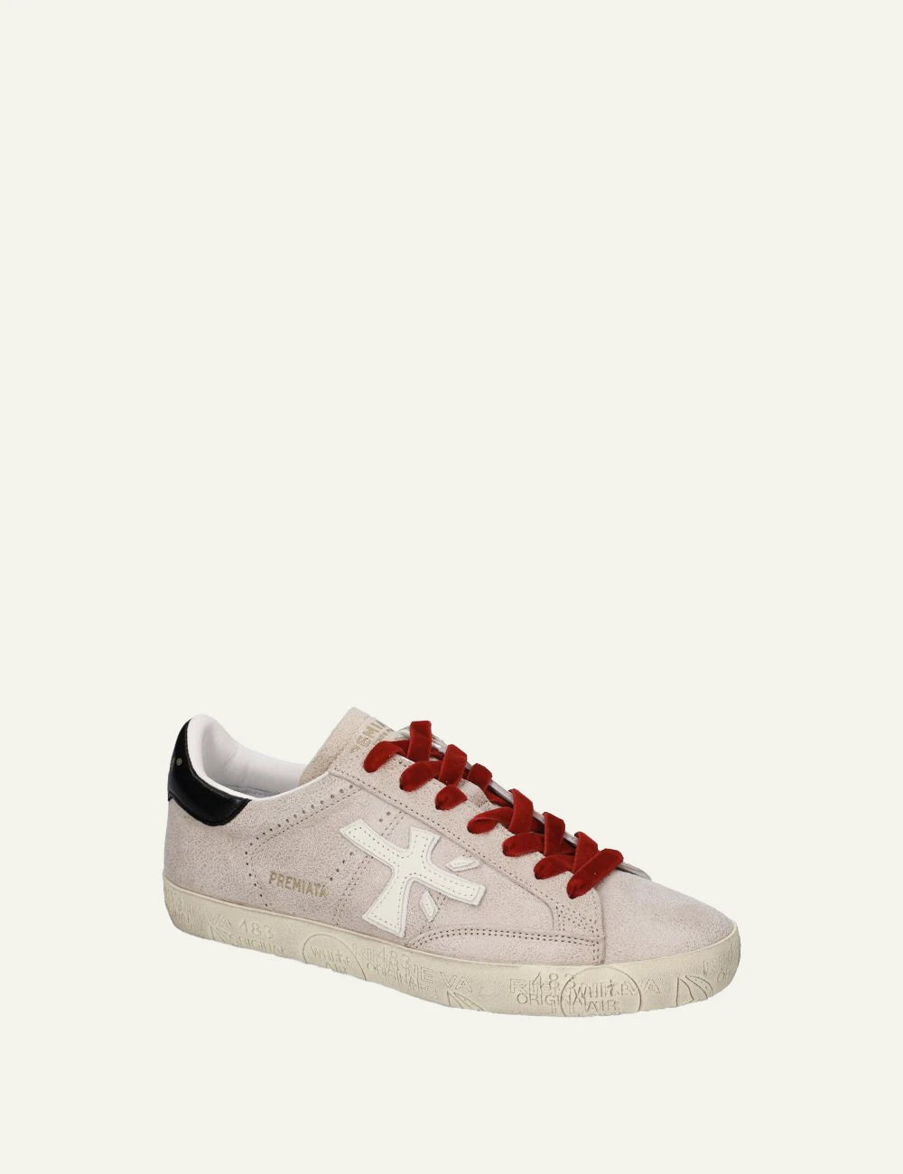 Premiata men's light beige leather sneakers with red laces and black details angled