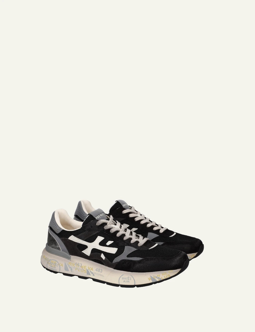 Premiata Mick sneaker black suede mesh side angled view