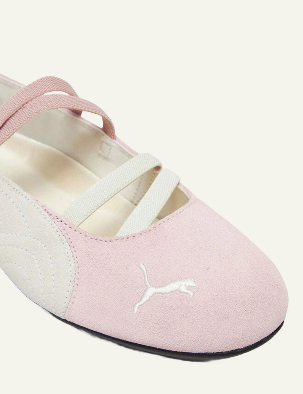 Puma Speedcat Ballet pink angled front view criss cross straps