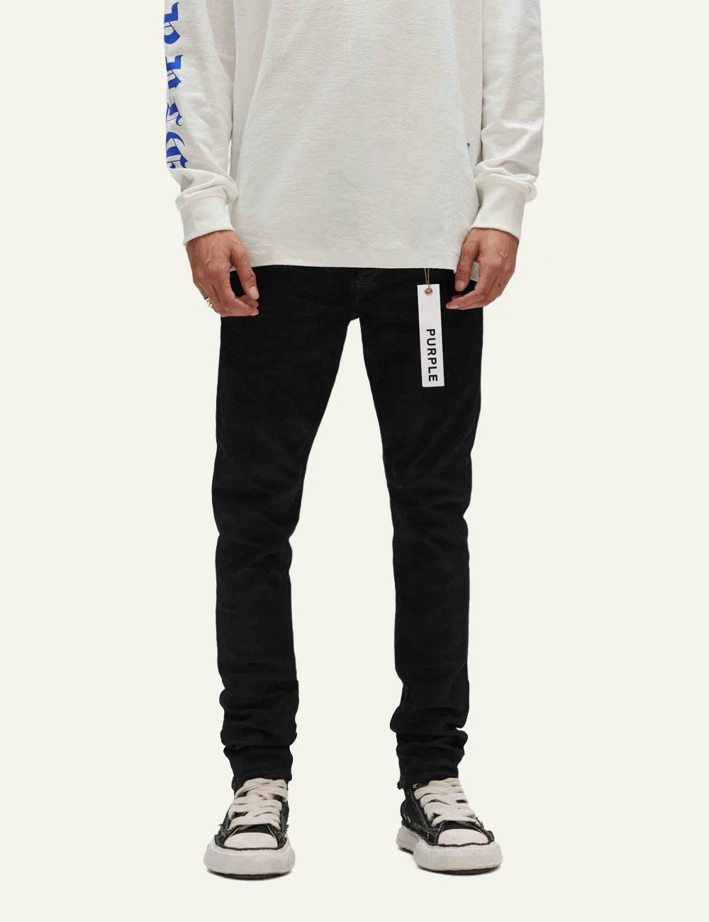 Purple Brand black skinny jeans with resin coated finish front model view