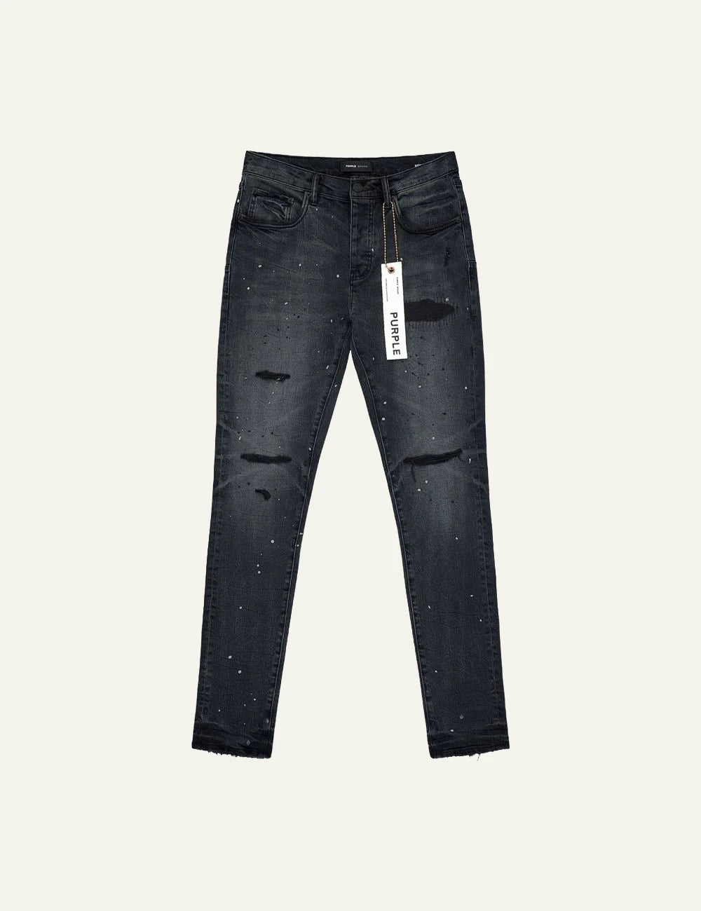 Purple Brand black skinny jeans with distressed knees and paint splatter front view