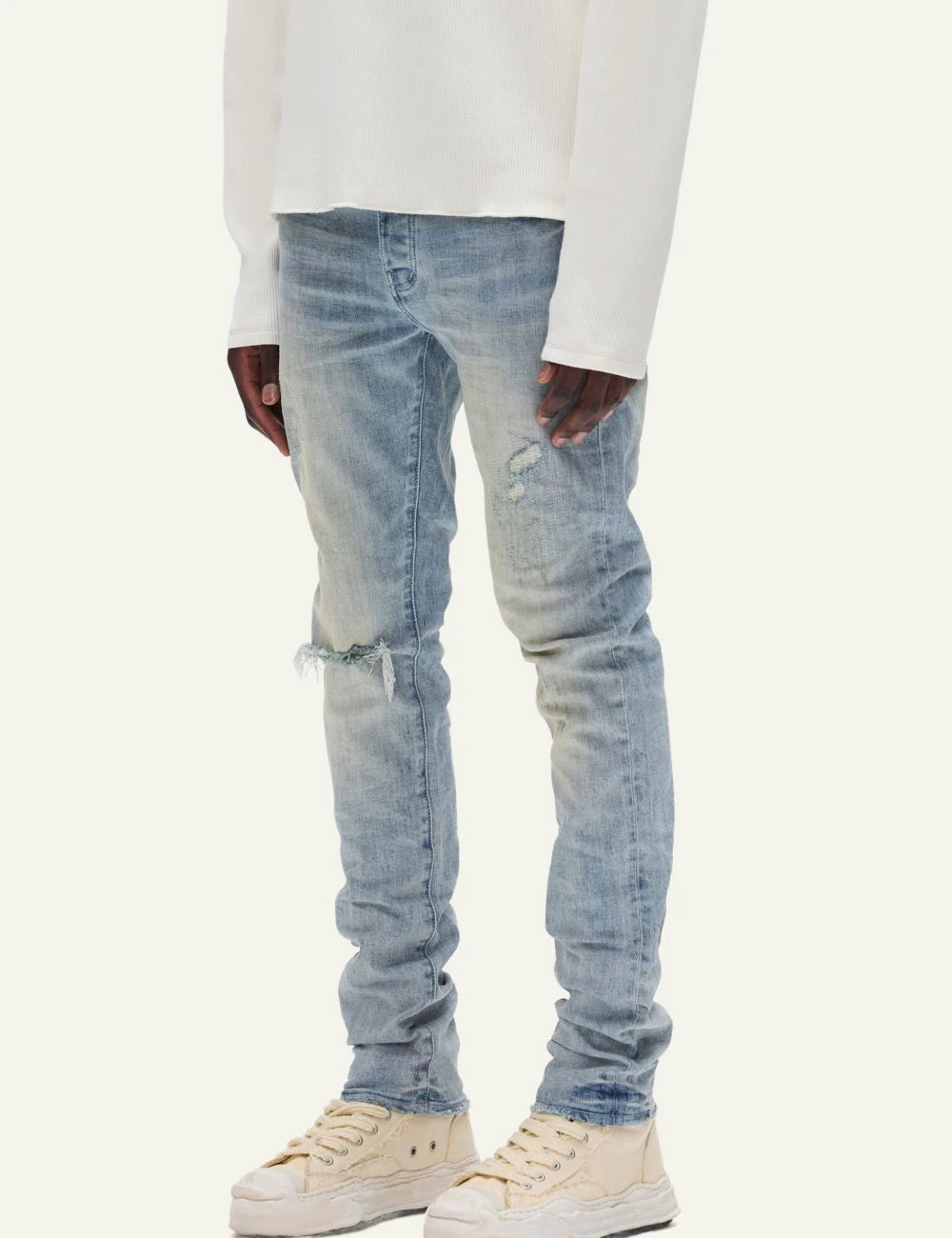 Purple Brand light blue skinny jeans with distressed knee detail side view