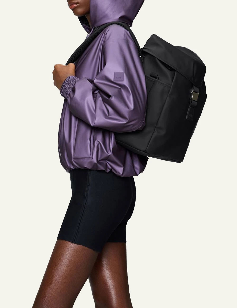 Rains Backpack Black side model view