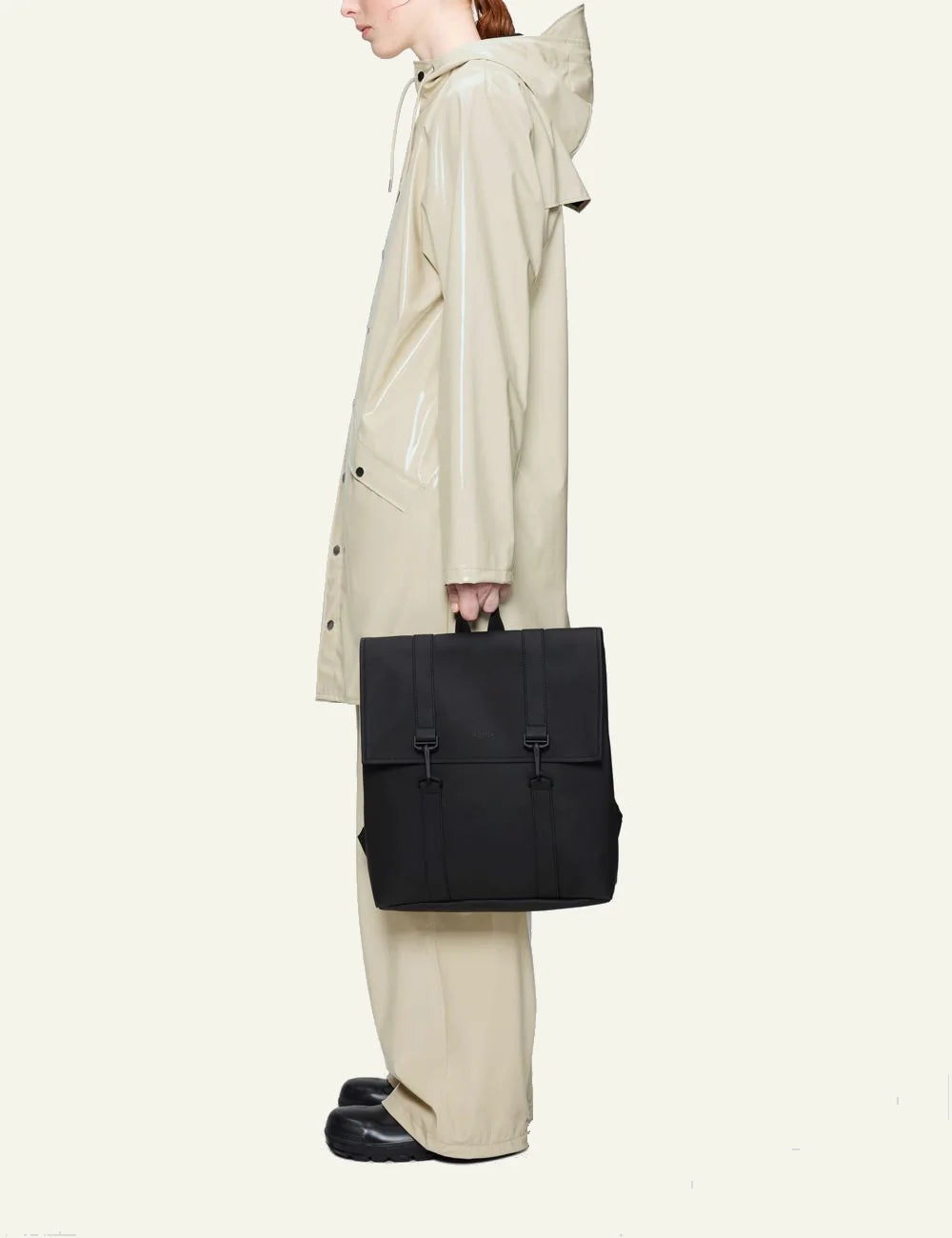 Rains Backpack Black model side view
