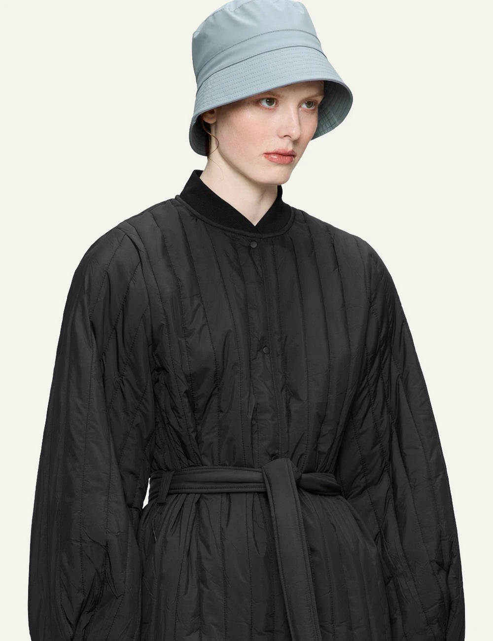 Rains bucket hat ice blue 3/4 front model