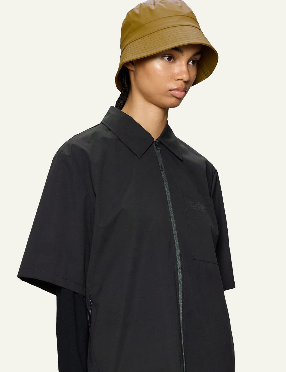 Rains bucket hat mustard 3/4 front model