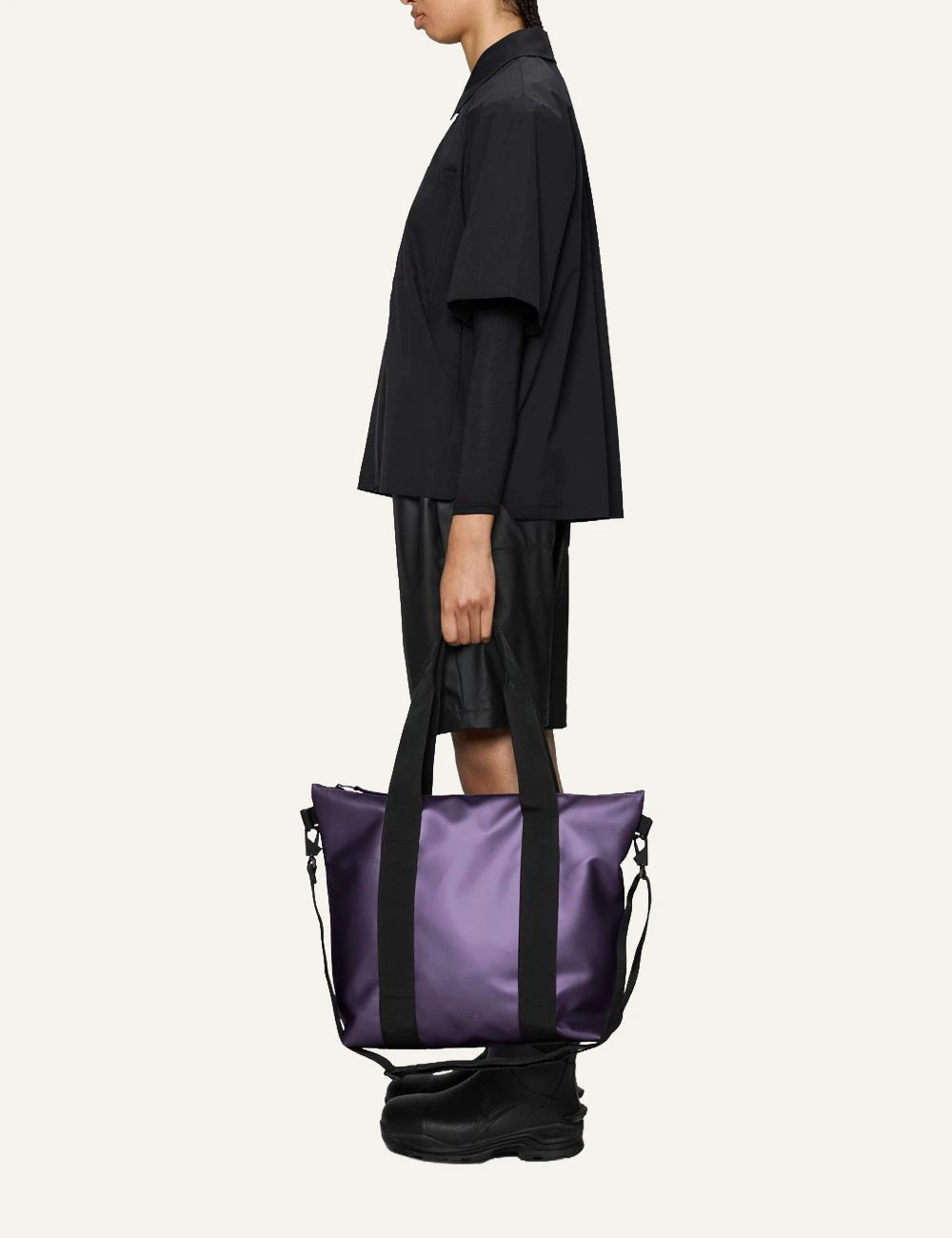 Rains Backpack Purple metallic model side view