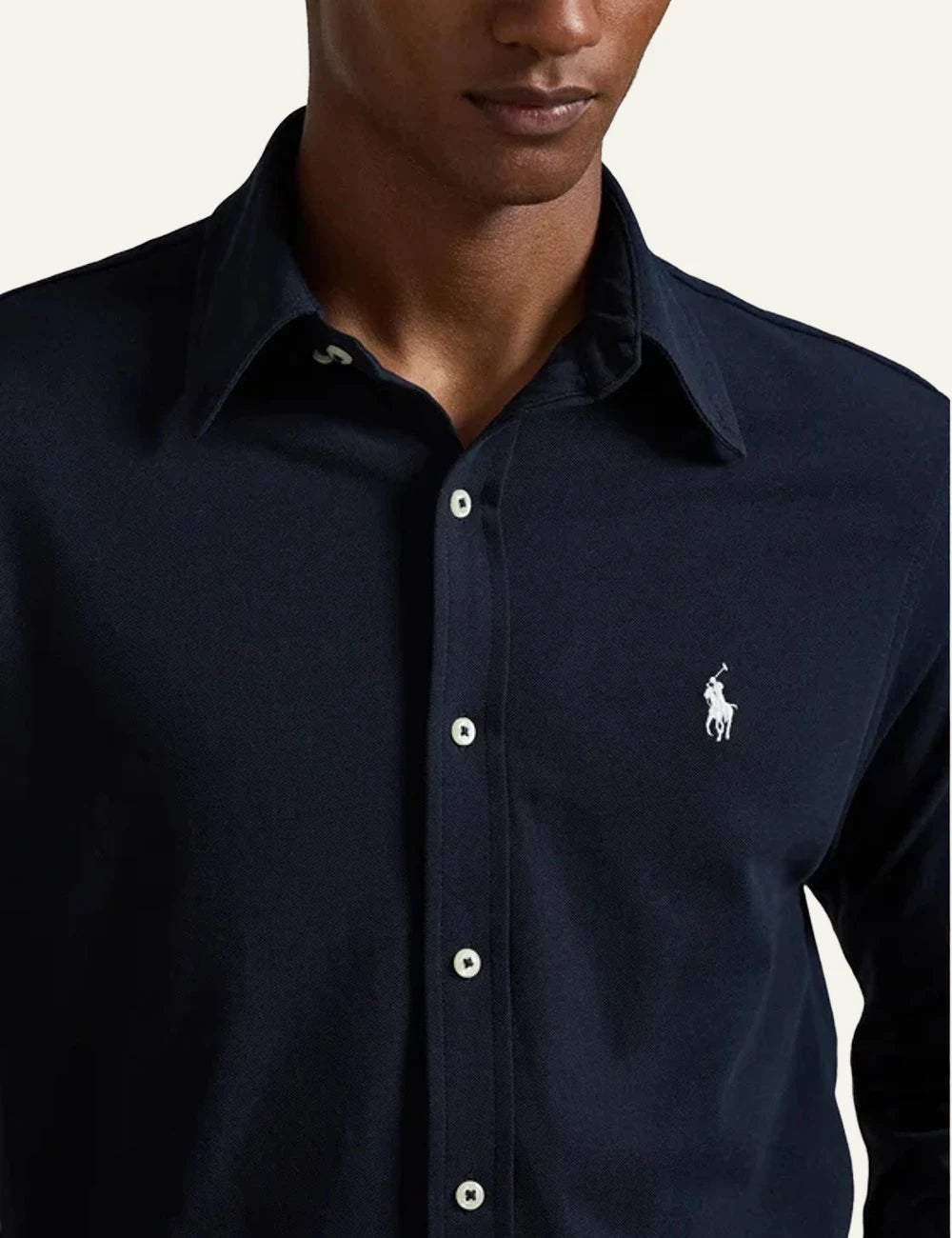 Ralph Lauren navy shirt with white pony logo styled on model logo view