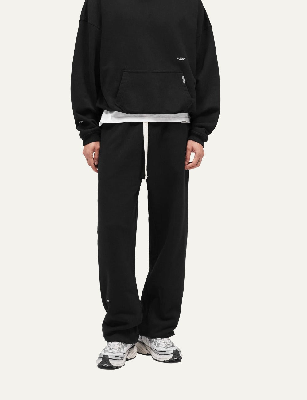 Represent Micro Owners Club wide leg black sweatpants with white drawstring model
