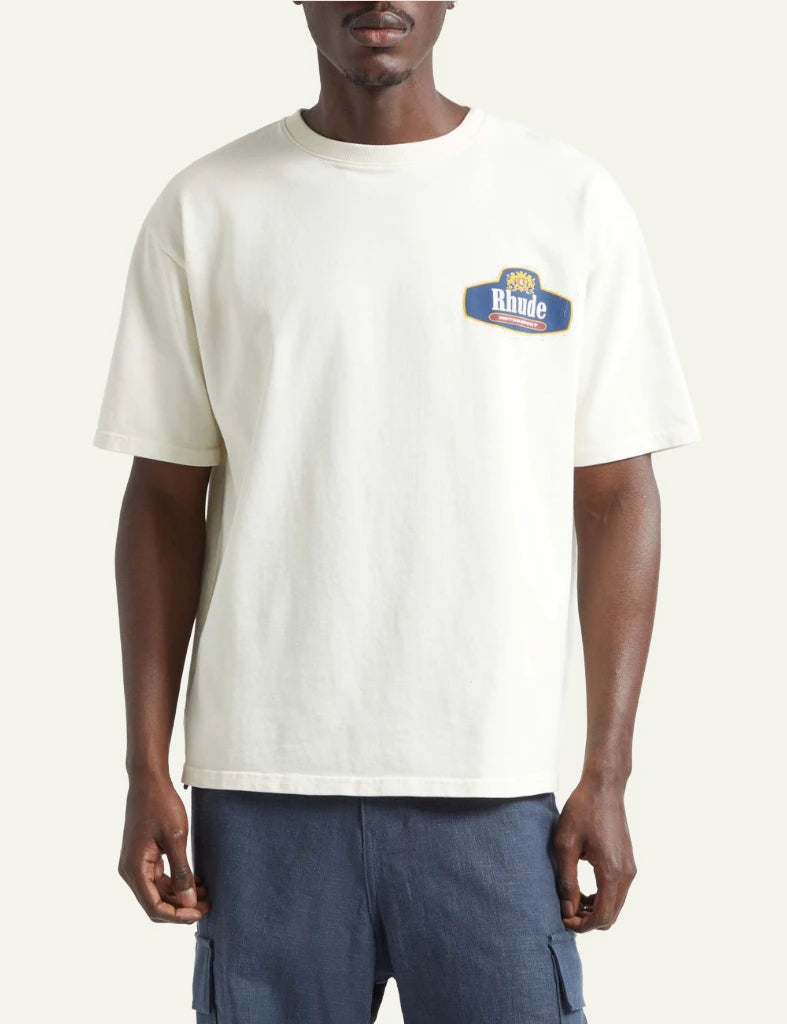 Rhude logo tee off white relaxed fit short sleeve chest logo front model view
