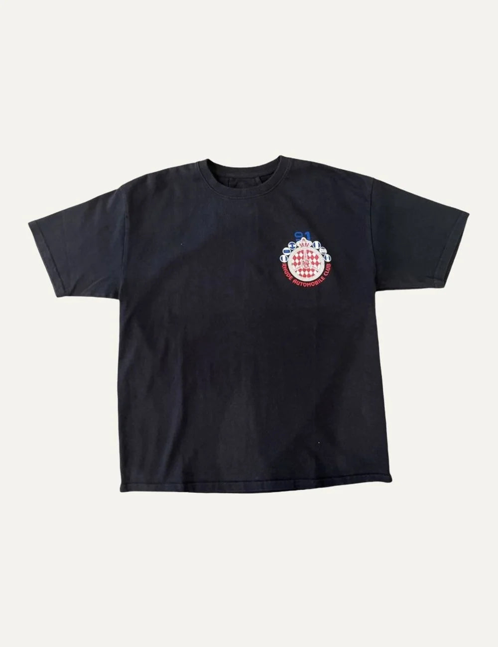 Rhude men's black crew neck T-shirt with short sleeves and multicolor Automobile Club crest graphic on the chest.