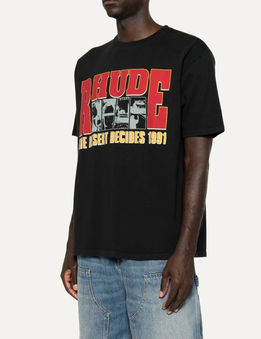 Rhude men's black cotton T-shirt with oversized red and yellow logo, black-and-white graphic panels and The Desert Decides 1991 front print side