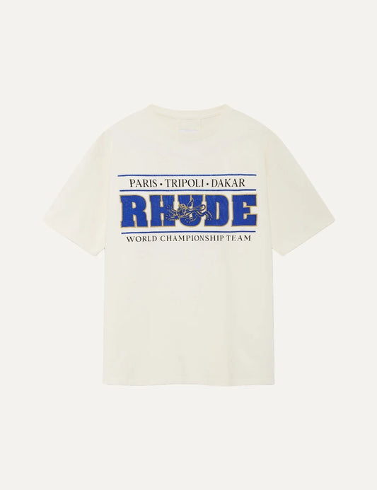 Rhude men's cream cotton T-shirt with blue and gold Chrono Championship Team graphic, Paris Tripoli Dakar lettering, crew neck and short sleeves.