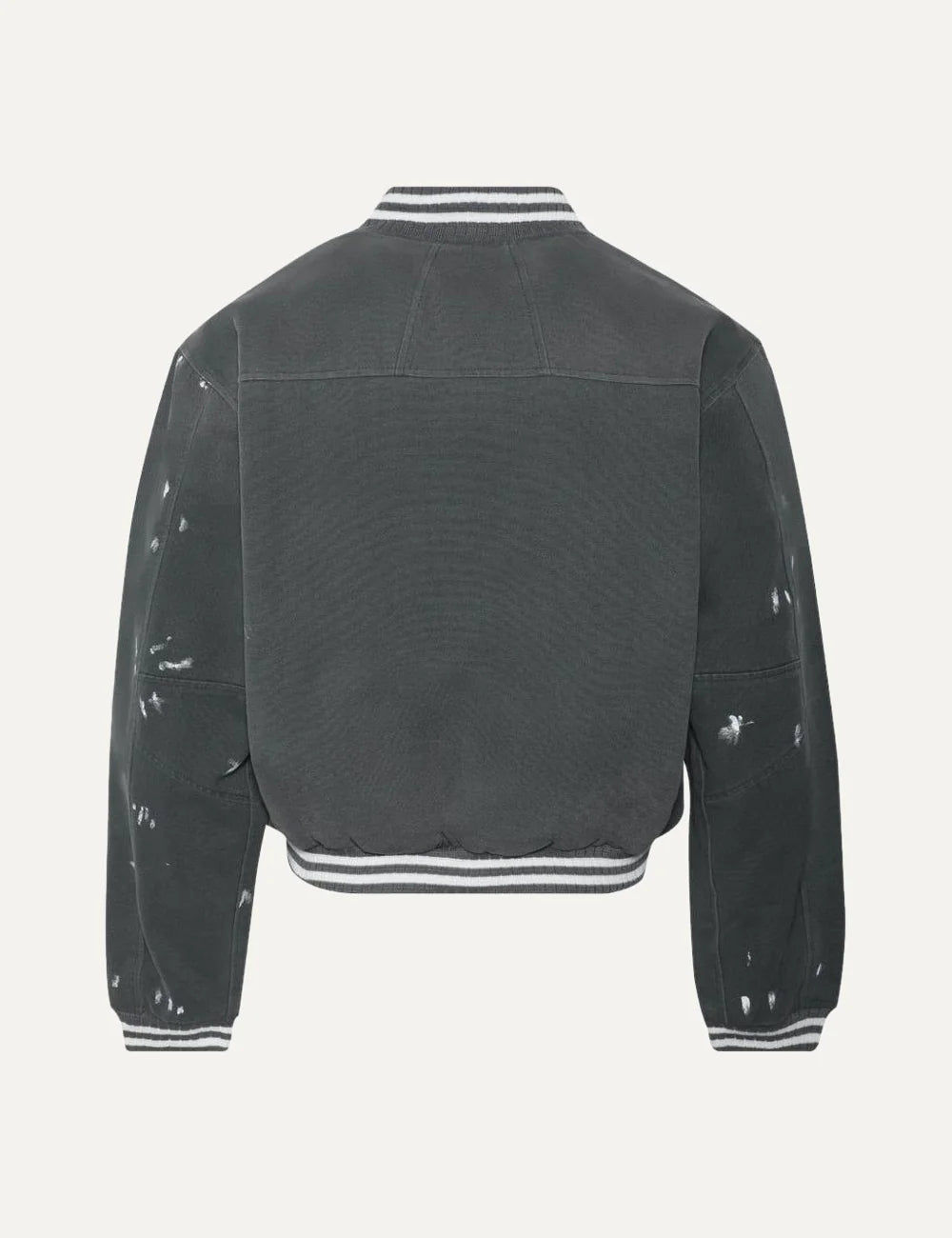 Rhude men's grey washed cotton varsity jacket with oversized white logo patch, paint-splatter details, snap buttons and striped ribbed trims back