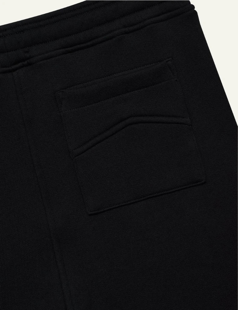 Rhude black sweat shorts mustard drawstrings logo close view