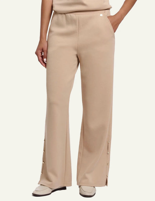 Rino Pelle Gloria trousers wide leg beige side slit studs front model view