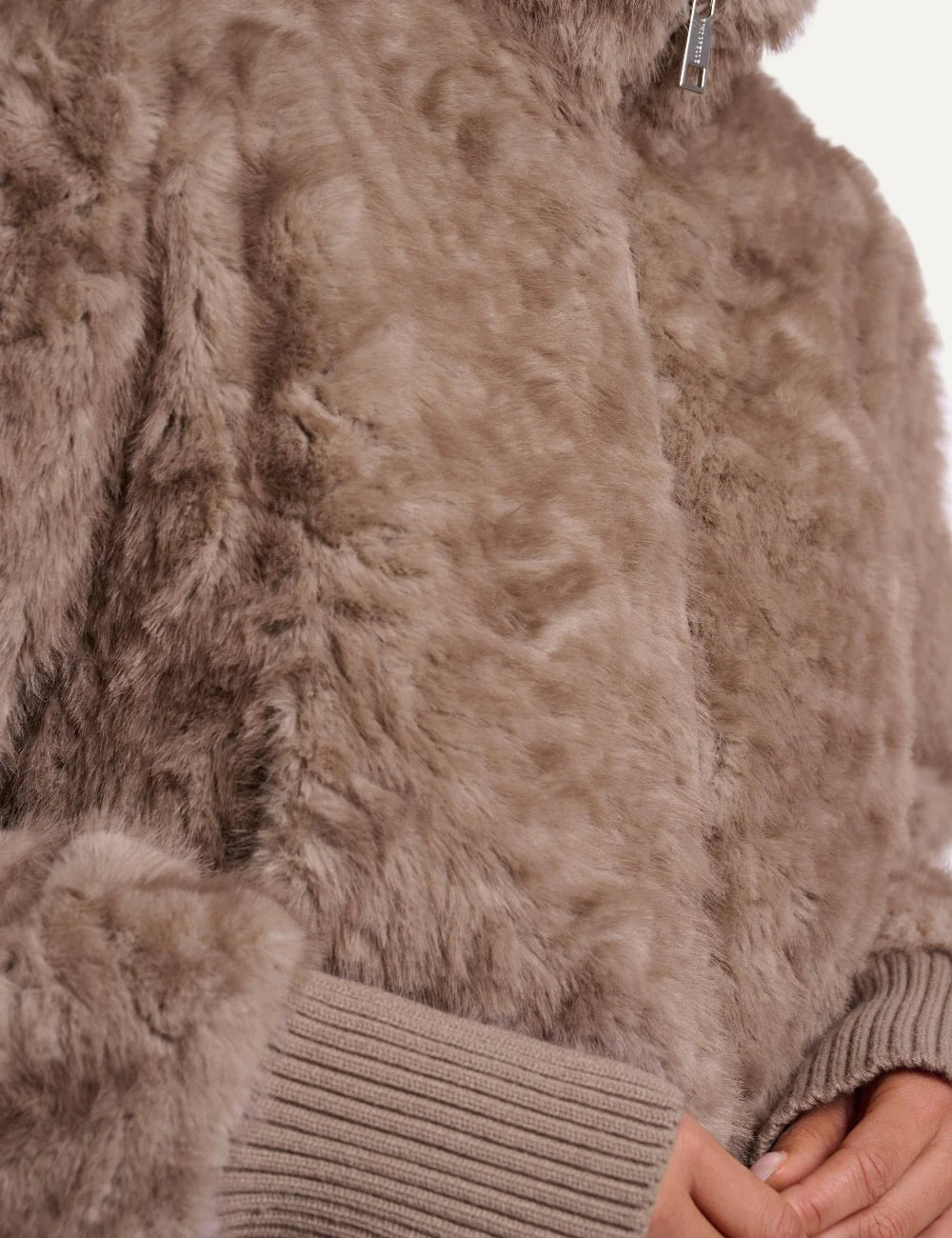 Rino Pelle women's birch beige faux fur jacket with textured finish, high collar and wide ribbed knit cuffs and hem close up fabric detail