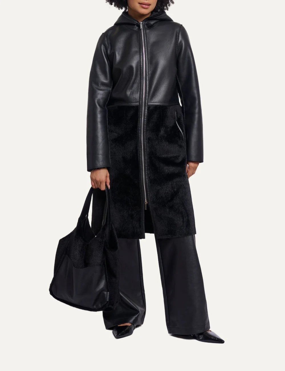 Rino Pelle women's black faux fur handbag with faux leather front pocket, double shoulder handles and detachable strap full body
