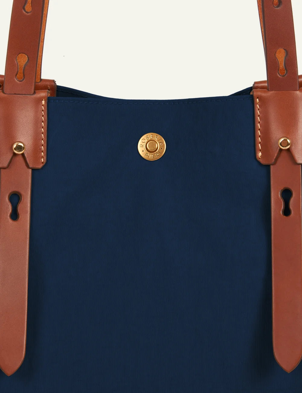 Roberta Pieri navy tote bag brown leather handles detail view