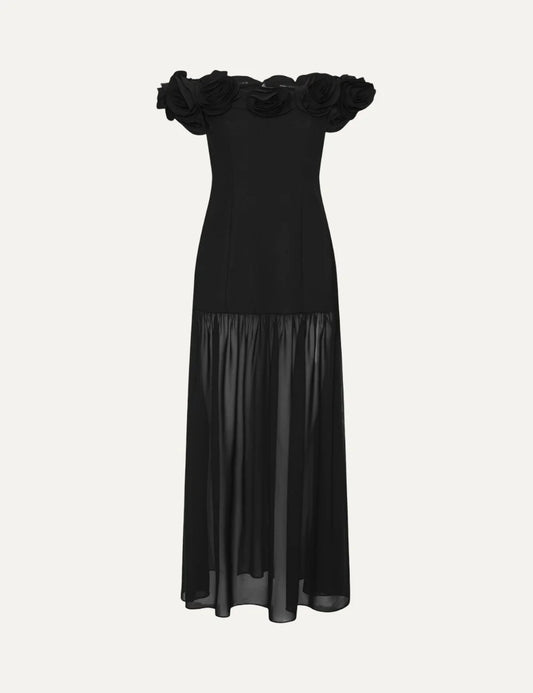 Women's black crepe Maxi dress with an off-shoulder neckline, floral details, fitted bodice and flowing sheer skirt.