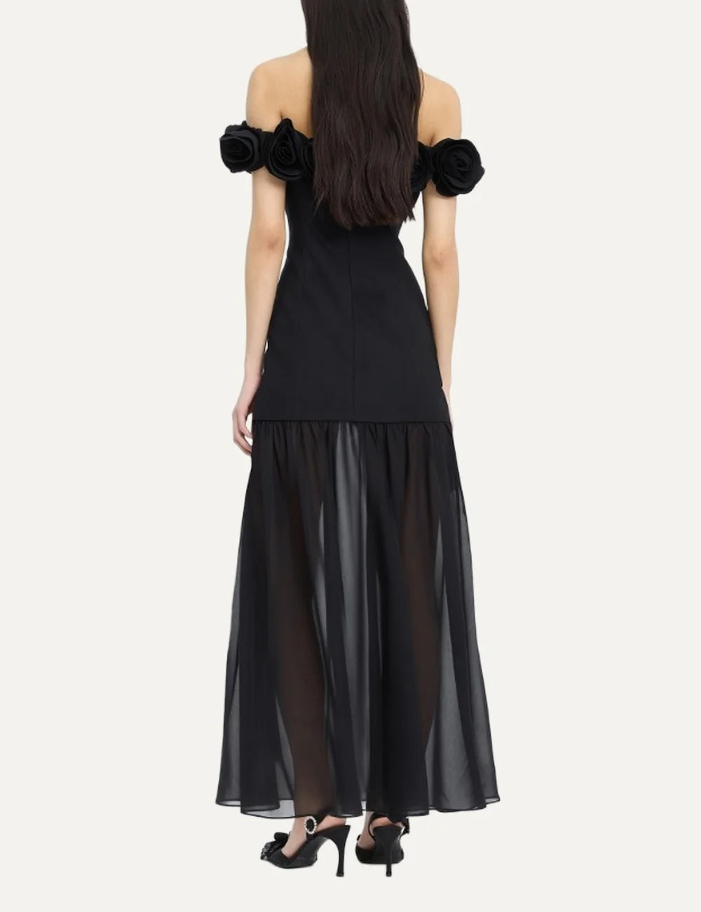 Women's black crepe Maxi dress with an off-shoulder neckline, floral details, fitted bodice and flowing sheer skirt back