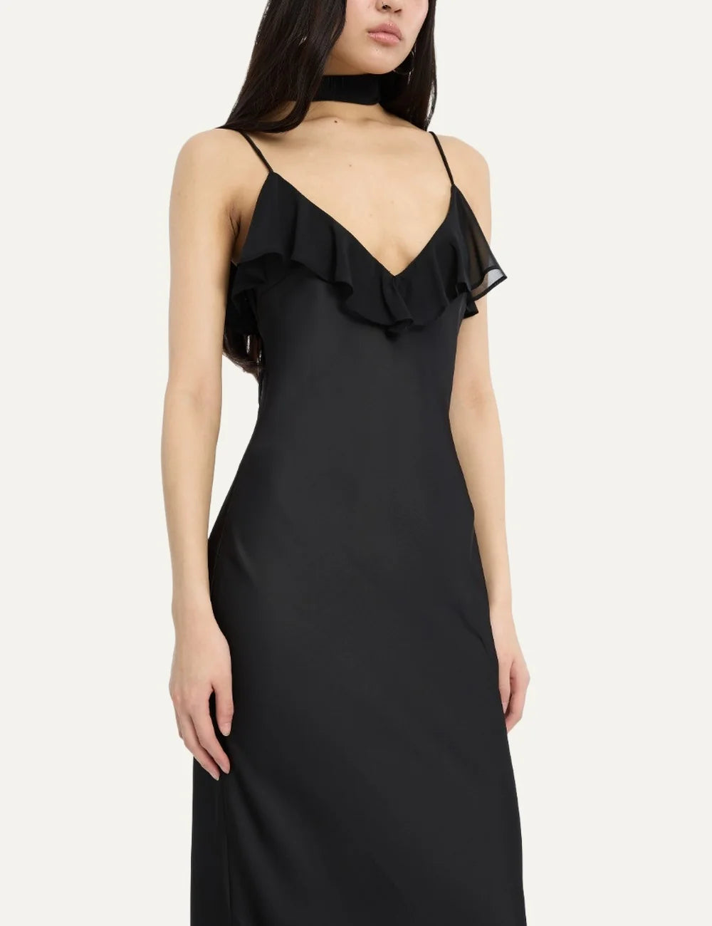 Rotate women black maxi slip dress with deep V-neck, thin straps, ruffle trim and long scarf detail model