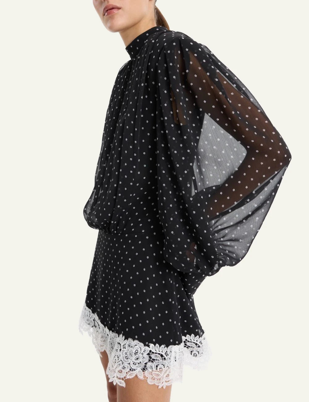 Rotate black polka dot mini dress with lace hem side view