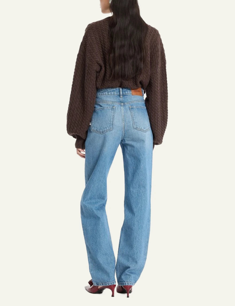 Rotate blue high waist cutline jeans with curved seam detail back view