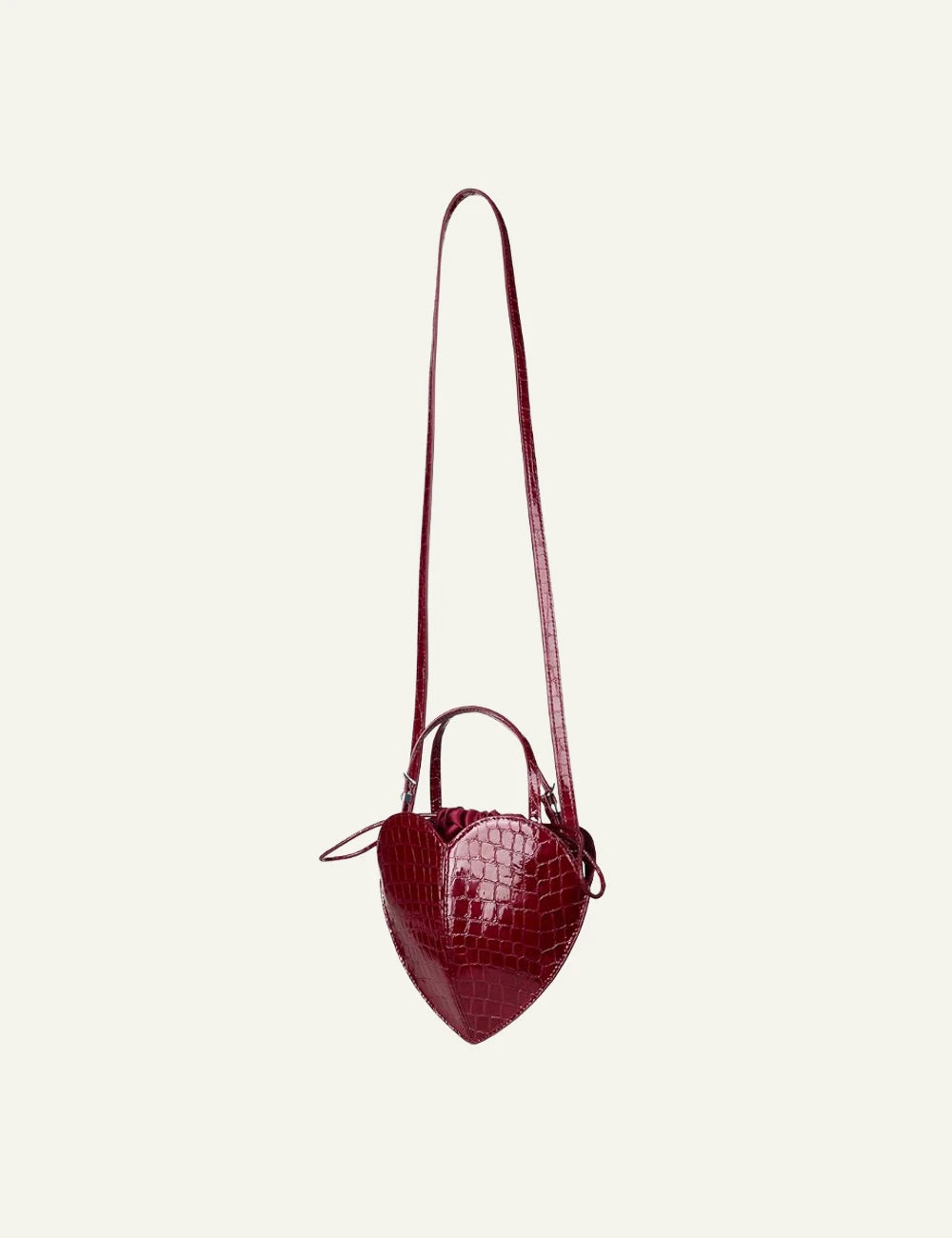 Rotate Heart Bag bordeaux croco leather tsanta side view