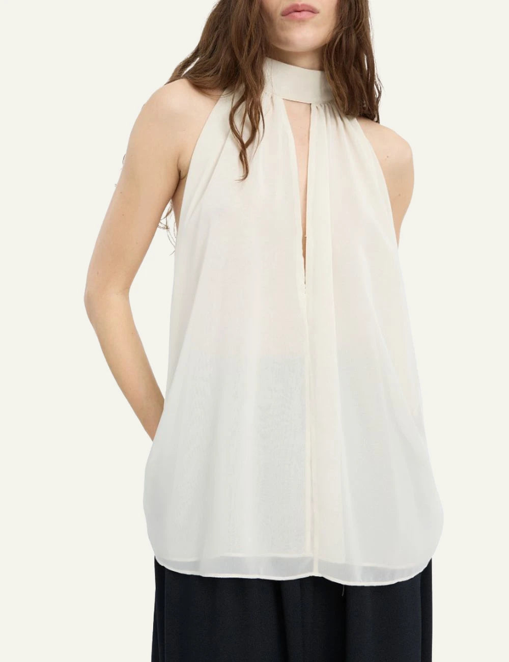 Women's Rotate white halterneck top with bow tie and draped silhouette model