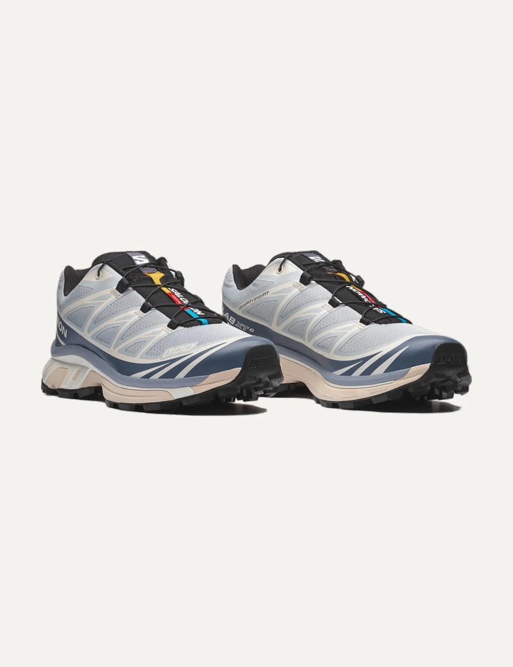 Salomon unisex XT-6 light blue and cream sneakers with navy details front angle view