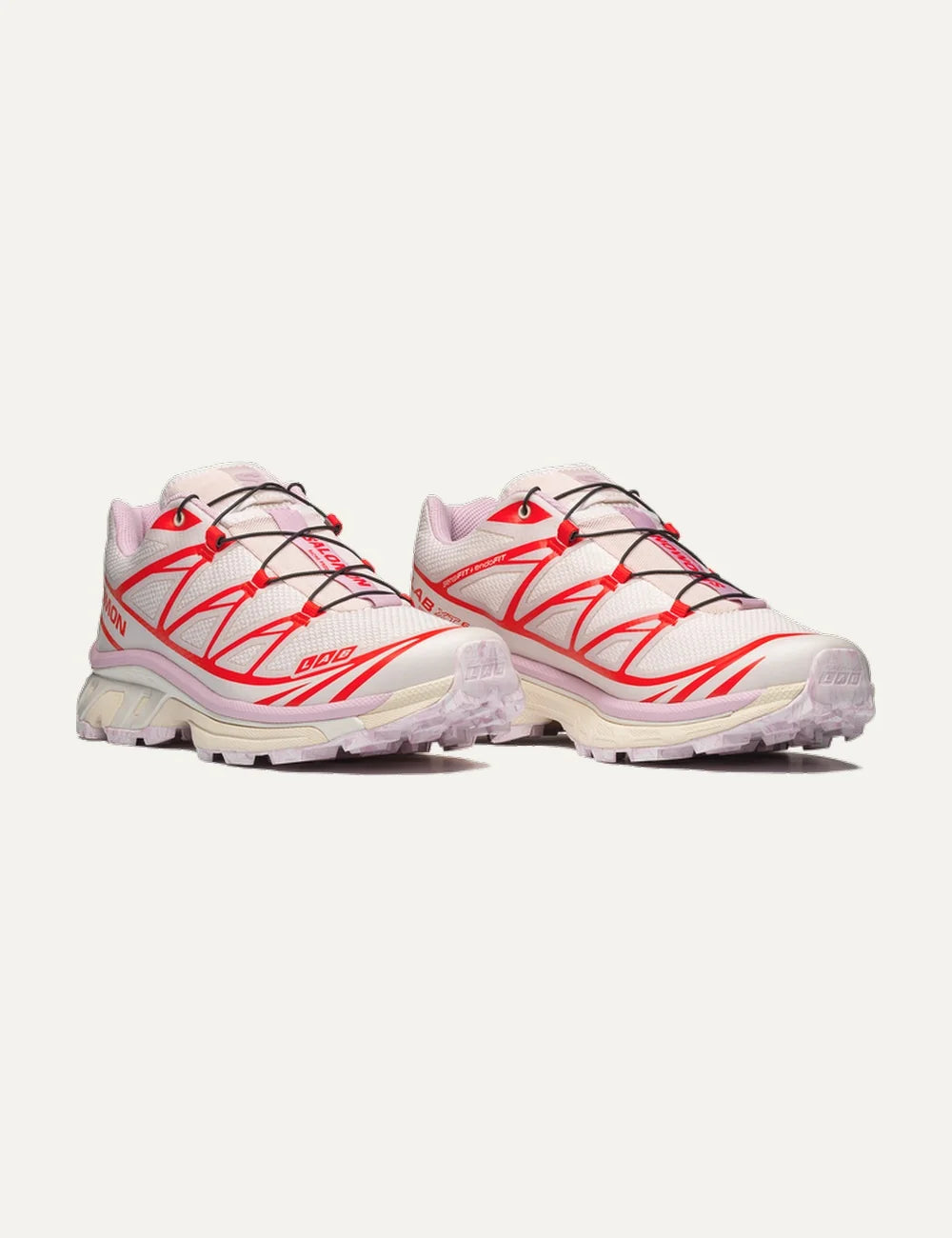 Salomon women XT-6 Nostalgia white and pink sneakers with red details front angle view