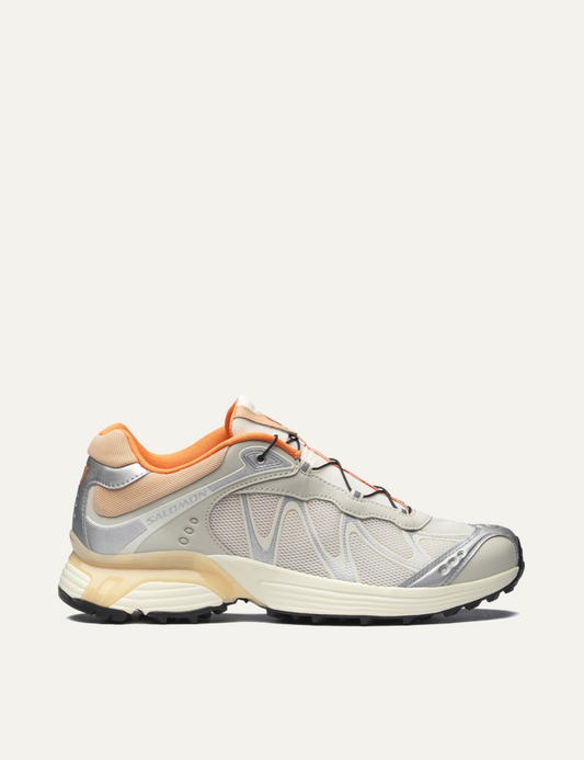Salomon XT-Whisper off white sneaker with silver and orange details side view