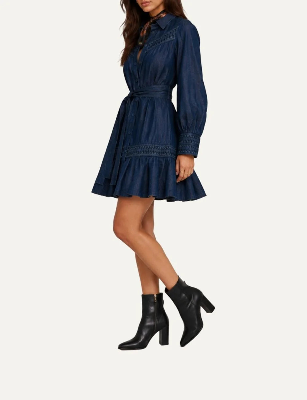 Scarlet Poppies women's Dala dark blue denim mini shirt dress with origami-inspired detailing, long puff sleeves, button-front closure, detachable waist belt and ruffled hem side
